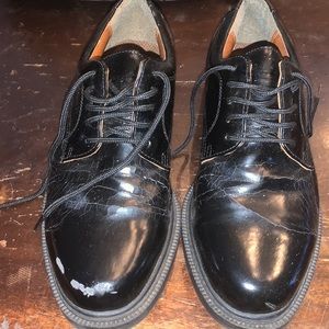 Mens gently used black wing tip dress shoes. Barely worn